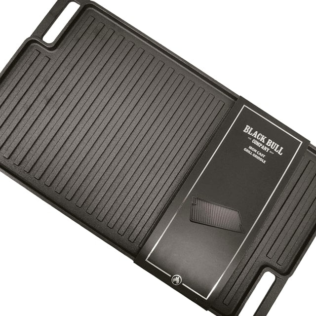 Plancha reversible de hierro fundido Black Bull, 45x25 cm, superficie lisa y estriada, ideal para pancakes y asados, resistente hasta 537°C.-2-3-1-1