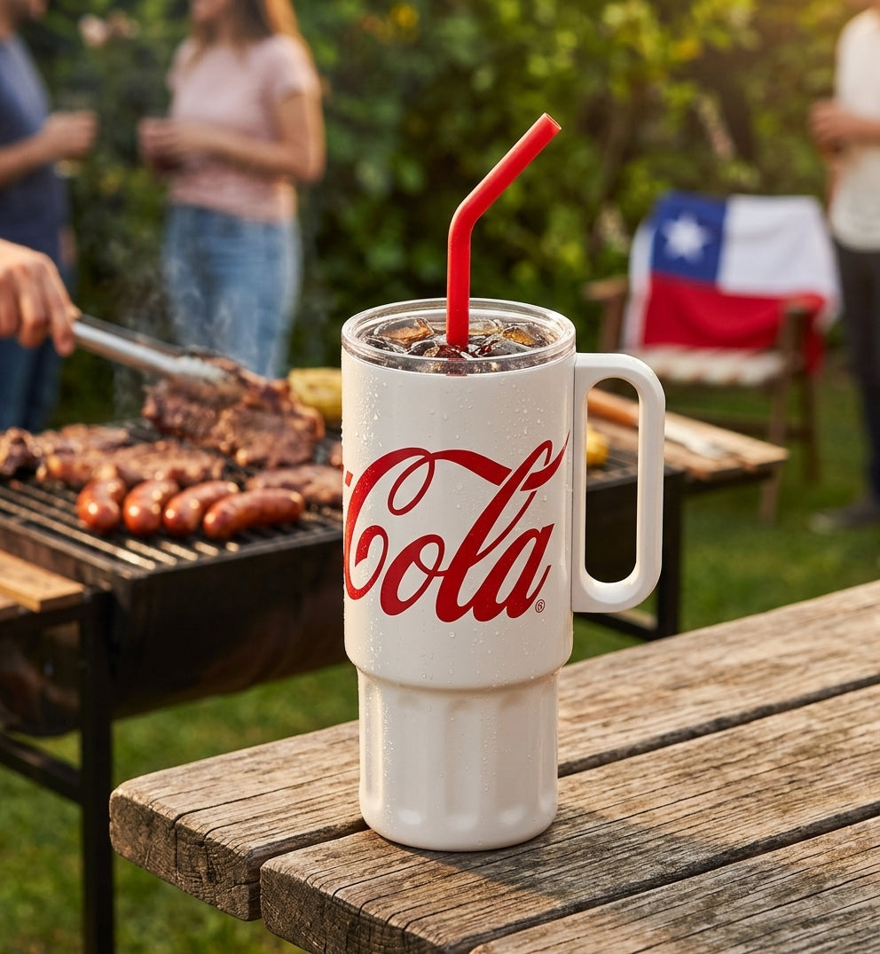Vaso tumbler Coca-Cola GERM sobre mesa asado quincho chileno verano