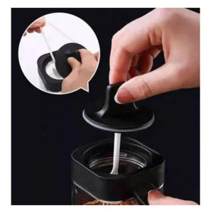 Especiero moderno de 3 frascos negros de plástico, con tapas herméticas y diseño elegante, ideal para organizar especias en la cocina.-1-3-1