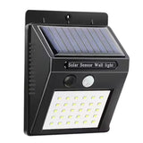 Luz Solar LED de Pared negra, 30 LEDs, resistente al agua, con sensor de movimiento y carga solar. Ideal para exteriores y fácil instalación.-1