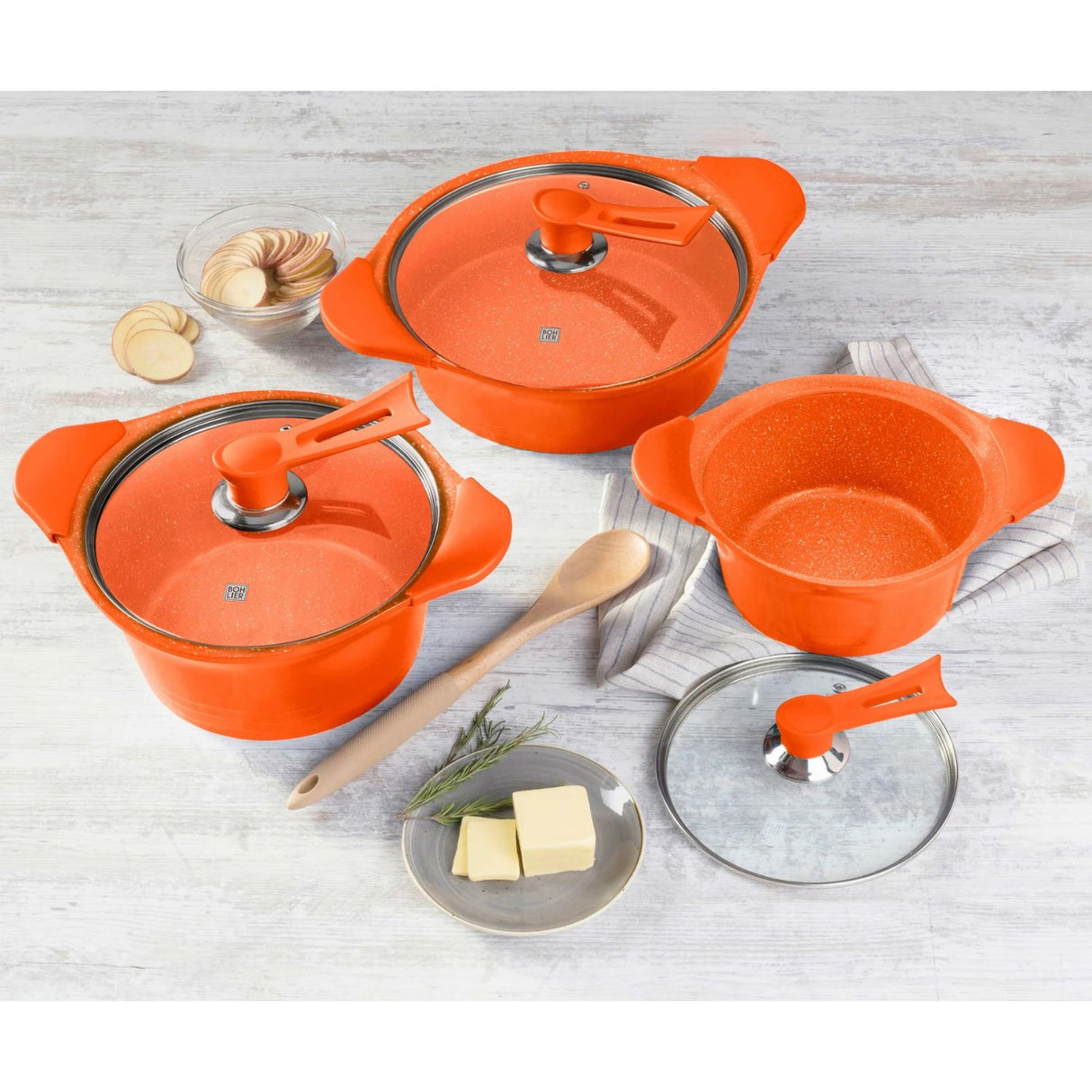 Batería de cocina Bohlier de 6 piezas en aluminio fundido naranja, con recubrimiento antiadherente y tapas de vidrio templado, ideal para cocinar saludablemente.-6