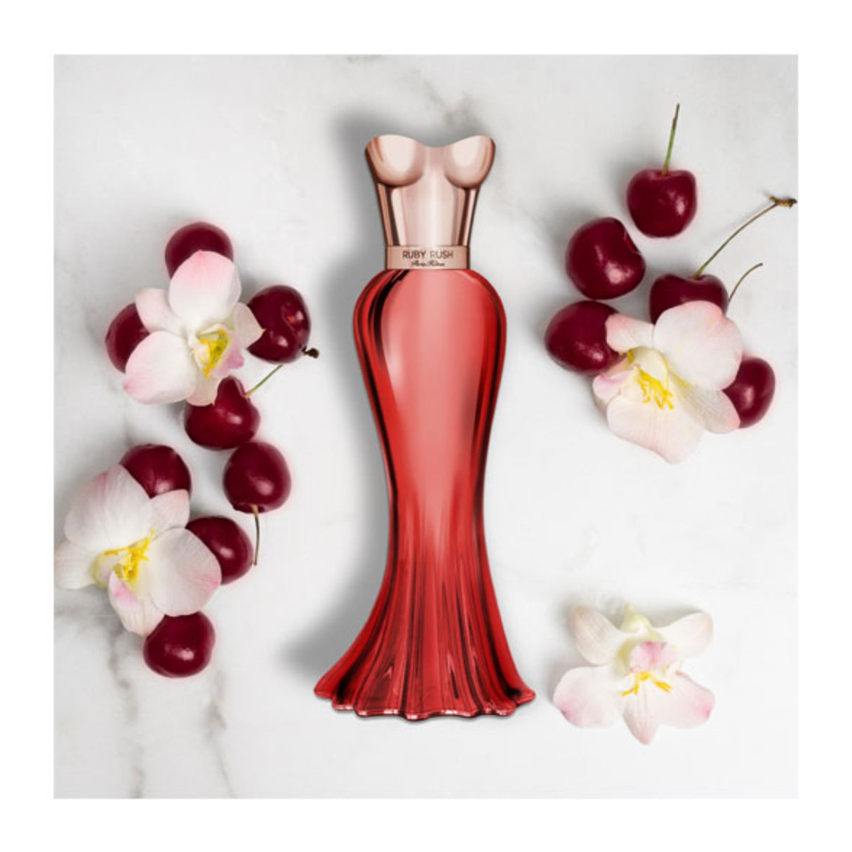 Paris Hilton Ruby Rush EDP 100 Ml Mujer. Una fragancia seductora y vibrante que resalta tu esencia. ¡Descúbrela y deslumbra hoy!-2