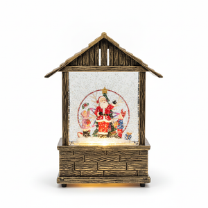 Adorno navideño casita musical Viejito Pascuero luz LED nieve giratoria vista frontal