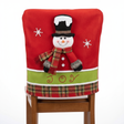 Funda silla navidad mono nieve rojo JOY vista frontal sobre silla madera