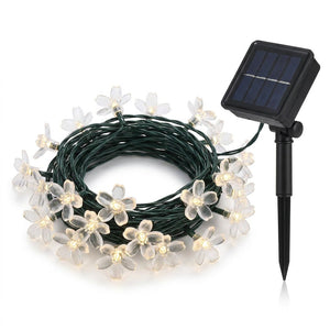 Guirnalda solar 20 luces LED flores jardín 6m luz cálida vista frontal