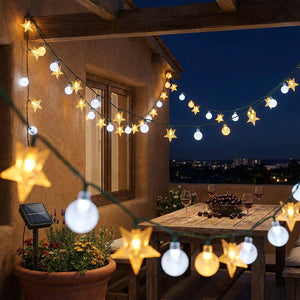 Guirnalda solar luces estrellas quincho terraza chilena noche navidad
