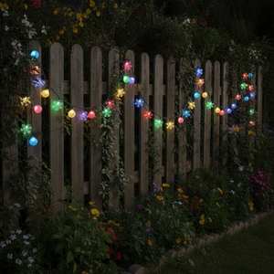 Guirnalda LED solar colores jardín chileno cerca madera exterior festivo nocturno