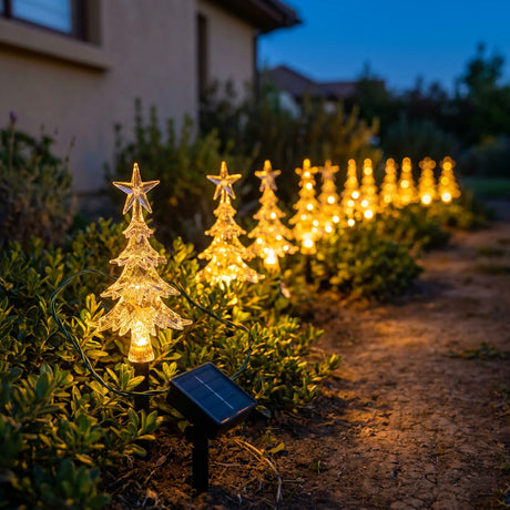 Set 10 estacas solares LED arbolitos navidad acrílico luz cálida fondo blanco