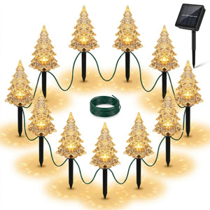 Estacas solares arbolitos navidad terraza chilena luz cálida dorada noche