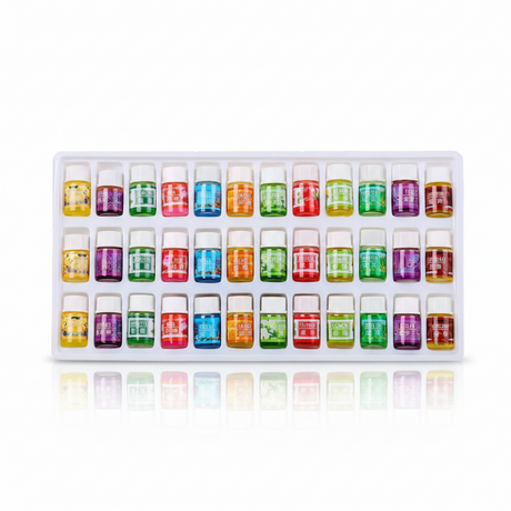 Pack 36 aceites esenciales aromaterapia humidificador colores vista frontal fondo blanco