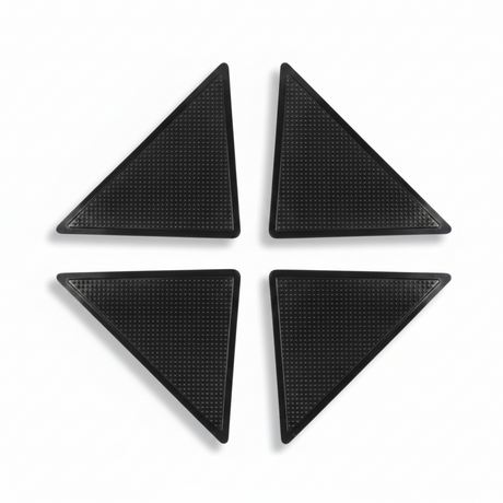 Pack 4 antideslizantes triangulares alfombra negros vista frontal fondo blanco