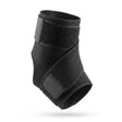 Tobillera compresión DeRoyal negra con velcro soporte tobillo vista frontal fondo blanco