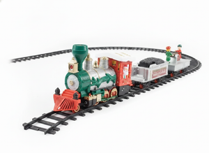 Niños jugando tren navideño pista oval sala living decoración navidad Chile