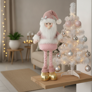 Mono navideño pascuero rosado patas largas en living con árbol blanco